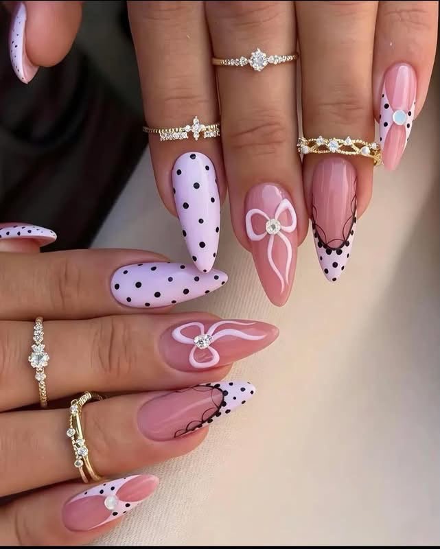 Polka dot and bow nail art